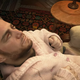 A beautiful baby, resting its weary head.